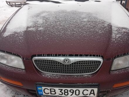 Червоний Мазда Кседос 9, об'ємом двигуна 2 л та пробігом 380 тис. км за 1350 $, фото 1 на Automoto.ua