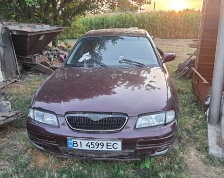 Червоний Мазда Кседос 9, об'ємом двигуна 2 л та пробігом 150 тис. км за 1500 $, фото 1 на Automoto.ua