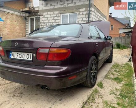 Красный Мазда Кседос 9, объемом двигателя 2 л и пробегом 285 тыс. км за 2000 $, фото 1 на Automoto.ua