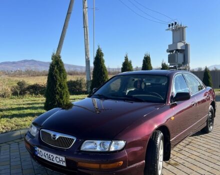 Червоний Мазда Кседос 9, об'ємом двигуна 2.5 л та пробігом 200 тис. км за 1850 $, фото 1 на Automoto.ua