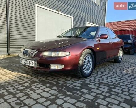 Красный Мазда Кседос 9, объемом двигателя 2 л и пробегом 240 тыс. км за 2050 $, фото 1 на Automoto.ua