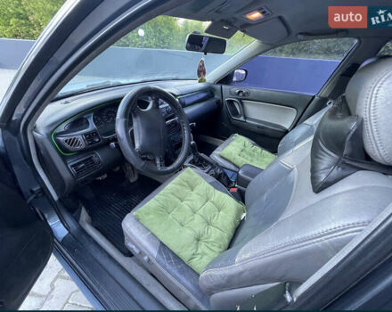 Сірий Мазда Кседос 9, об'ємом двигуна 2 л та пробігом 300 тис. км за 1650 $, фото 7 на Automoto.ua