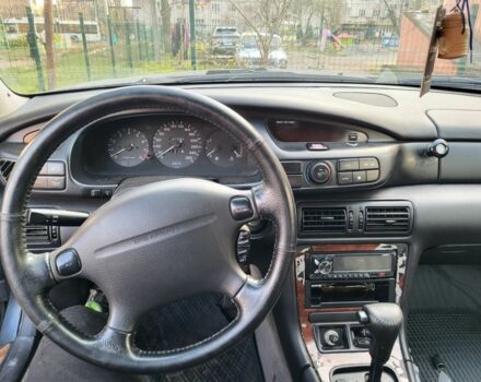 Серый Мазда Кседос 9, объемом двигателя 2.5 л и пробегом 240 тыс. км за 1100 $, фото 2 на Automoto.ua