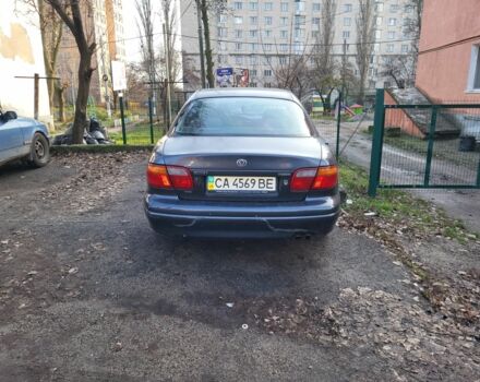 Серый Мазда Кседос 9, объемом двигателя 2.5 л и пробегом 240 тыс. км за 1100 $, фото 8 на Automoto.ua