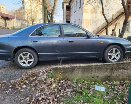 Серый Мазда Кседос 9, объемом двигателя 2.5 л и пробегом 240 тыс. км за 1100 $, фото 7 на Automoto.ua