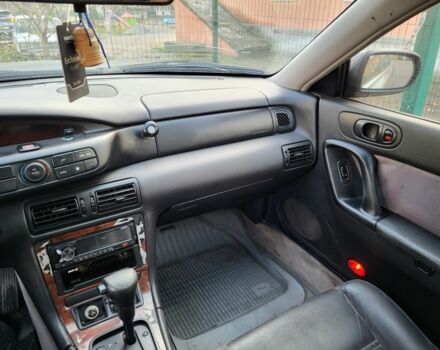 Серый Мазда Кседос 9, объемом двигателя 2.5 л и пробегом 240 тыс. км за 1100 $, фото 1 на Automoto.ua