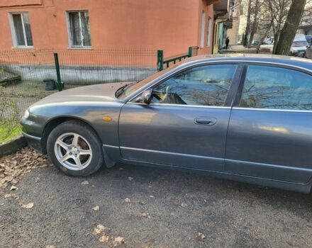 Серый Мазда Кседос 9, объемом двигателя 2.5 л и пробегом 240 тыс. км за 1100 $, фото 5 на Automoto.ua