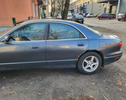 Серый Мазда Кседос 9, объемом двигателя 2.5 л и пробегом 240 тыс. км за 1100 $, фото 6 на Automoto.ua