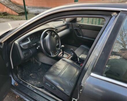 Серый Мазда Кседос 9, объемом двигателя 2.5 л и пробегом 240 тыс. км за 1100 $, фото 3 на Automoto.ua