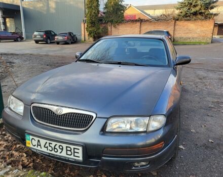 Серый Мазда Кседос 9, объемом двигателя 2.5 л и пробегом 240 тыс. км за 1100 $, фото 4 на Automoto.ua