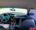 Серый Мазда Кседос 9, объемом двигателя 2 л и пробегом 388 тыс. км за 2350 $, фото 1 на Automoto.ua