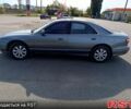 Серый Мазда Кседос 9, объемом двигателя 2 л и пробегом 388 тыс. км за 2350 $, фото 3 на Automoto.ua