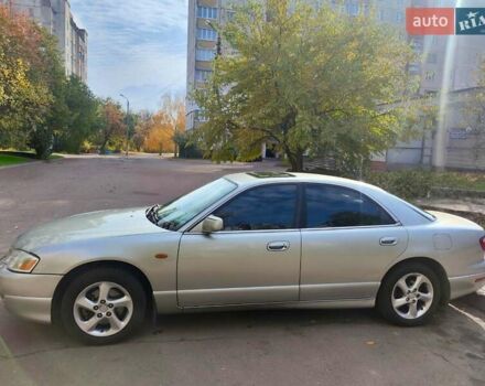 Серый Мазда Кседос 9, объемом двигателя 2.5 л и пробегом 274 тыс. км за 2700 $, фото 2 на Automoto.ua