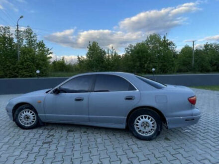 Мазда Кседос 9 1994 в Дунаевцах на Automoto.ua Серый Мазда Кседос 9, объемом двигателя 2 л и пробегом 300 тыс. км за 1650 $, фото 1 на Automoto.ua