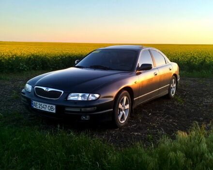 Серый Мазда Кседос 9, объемом двигателя 2.5 л и пробегом 340 тыс. км за 2000 $, фото 1 на Automoto.ua