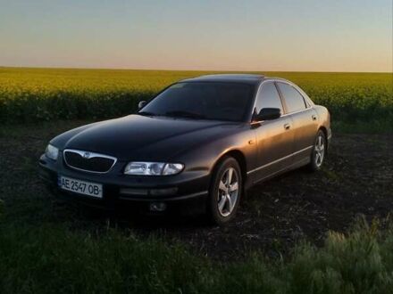 Сірий Мазда Кседос 9, об'ємом двигуна 2.5 л та пробігом 360 тис. км за 2300 $, фото 1 на Automoto.ua