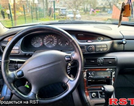 Сірий Мазда Кседос 9, об'ємом двигуна 2.5 л та пробігом 0 тис. км за 1000 $, фото 1 на Automoto.ua