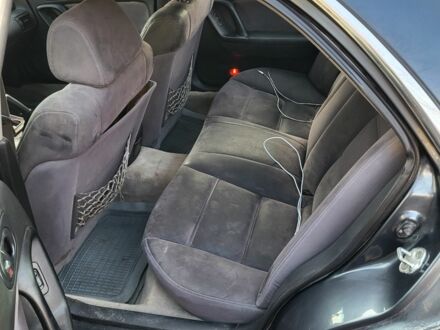 Серый Мазда Кседос 9, объемом двигателя 2.5 л и пробегом 240 тыс. км за 1100 $, фото 1 на Automoto.ua