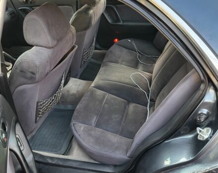 Серый Мазда Кседос 9, объемом двигателя 2.5 л и пробегом 240 тыс. км за 1100 $, фото 1 на Automoto.ua