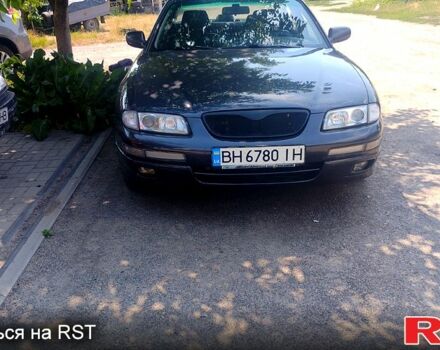 Серый Мазда Кседос 9, объемом двигателя 2.5 л и пробегом 341 тыс. км за 3500 $, фото 1 на Automoto.ua