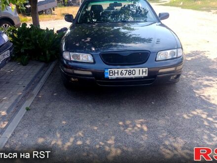 Мазда Кседос 9 1997 в Черкассах на Automoto.ua Серый Мазда Кседос 9, объемом двигателя 2.5 л и пробегом 341 тыс. км за 3500 $, фото 1 на Automoto.ua