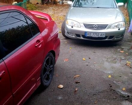 Серый Мазда Кседос 9, объемом двигателя 2.5 л и пробегом 330 тыс. км за 4000 $, фото 1 на Automoto.ua