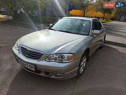 Серый Мазда Кседос 9, объемом двигателя 2.5 л и пробегом 274 тыс. км за 2700 $, фото 1 на Automoto.ua