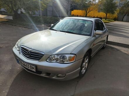 Серый Мазда Кседос 9, объемом двигателя 2.5 л и пробегом 274 тыс. км за 2700 $, фото 1 на Automoto.ua