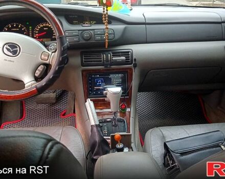 Синий Мазда Кседос 9, объемом двигателя 2 л и пробегом 250 тыс. км за 4000 $, фото 11 на Automoto.ua