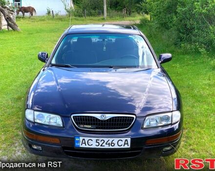 Синий Мазда Кседос 9, объемом двигателя 2 л и пробегом 350 тыс. км за 3300 $, фото 1 на Automoto.ua