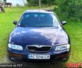 Синий Мазда Кседос 9, объемом двигателя 2 л и пробегом 350 тыс. км за 3300 $, фото 1 на Automoto.ua