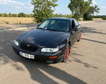 Синий Мазда Кседос 9, объемом двигателя 2.5 л и пробегом 420 тыс. км за 1800 $, фото 5 на Automoto.ua