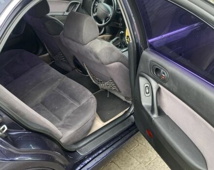 Синий Мазда Кседос 9, объемом двигателя 2 л и пробегом 407 тыс. км за 1950 $, фото 5 на Automoto.ua