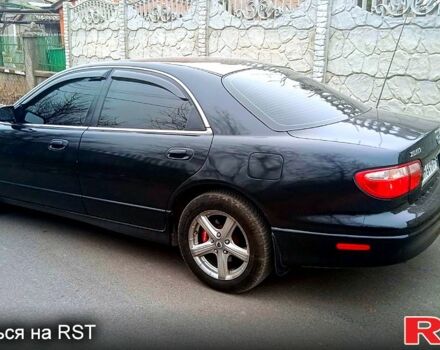 Синий Мазда Кседос 9, объемом двигателя 2 л и пробегом 250 тыс. км за 4000 $, фото 3 на Automoto.ua