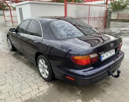 Синий Мазда Кседос 9, объемом двигателя 2 л и пробегом 407 тыс. км за 1950 $, фото 3 на Automoto.ua