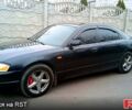 Синий Мазда Кседос 9, объемом двигателя 2 л и пробегом 250 тыс. км за 4000 $, фото 1 на Automoto.ua