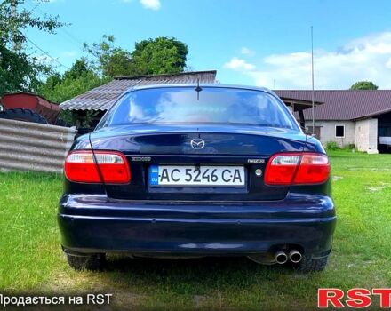 Синий Мазда Кседос 9, объемом двигателя 2 л и пробегом 350 тыс. км за 3300 $, фото 6 на Automoto.ua
