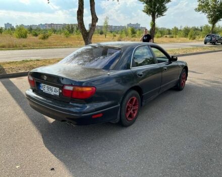 Синий Мазда Кседос 9, объемом двигателя 2.5 л и пробегом 420 тыс. км за 1800 $, фото 4 на Automoto.ua