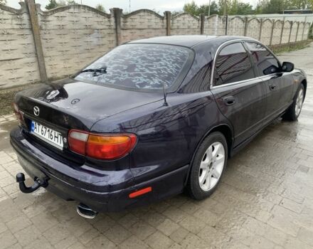 Синий Мазда Кседос 9, объемом двигателя 2 л и пробегом 407 тыс. км за 1950 $, фото 2 на Automoto.ua