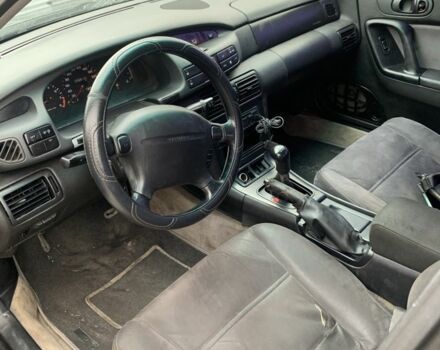 Синий Мазда Кседос 9, объемом двигателя 2 л и пробегом 407 тыс. км за 1950 $, фото 4 на Automoto.ua