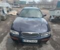 Синий Мазда Кседос 9, объемом двигателя 2 л и пробегом 334 тыс. км за 2000 $, фото 1 на Automoto.ua