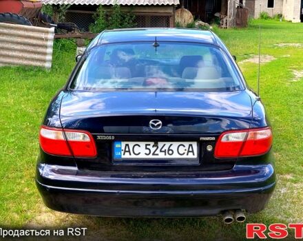 Синий Мазда Кседос 9, объемом двигателя 2 л и пробегом 350 тыс. км за 3300 $, фото 7 на Automoto.ua