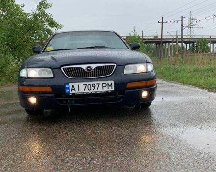 Синий Мазда Кседос 9, объемом двигателя 2.5 л и пробегом 385 тыс. км за 2200 $, фото 2 на Automoto.ua