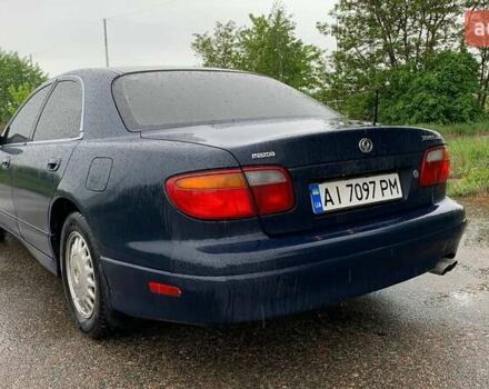 Синий Мазда Кседос 9, объемом двигателя 2.5 л и пробегом 380 тыс. км за 2100 $, фото 4 на Automoto.ua