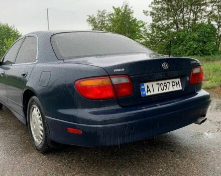 Синий Мазда Кседос 9, объемом двигателя 2.5 л и пробегом 385 тыс. км за 2200 $, фото 5 на Automoto.ua