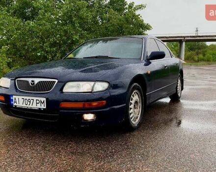 Синий Мазда Кседос 9, объемом двигателя 2.5 л и пробегом 380 тыс. км за 2100 $, фото 1 на Automoto.ua