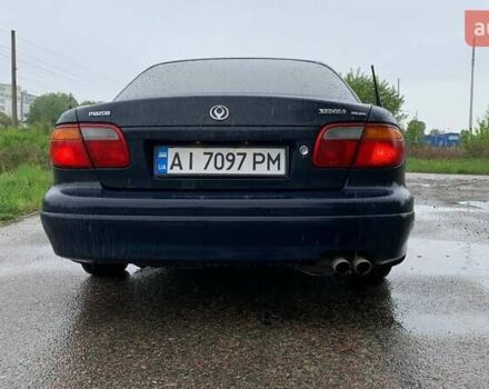 Синий Мазда Кседос 9, объемом двигателя 2.5 л и пробегом 380 тыс. км за 2100 $, фото 5 на Automoto.ua