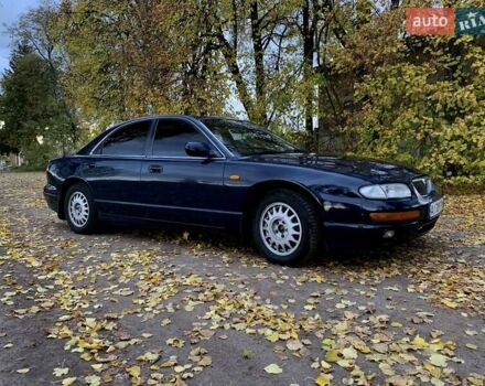 Синий Мазда Кседос 9, объемом двигателя 2.5 л и пробегом 380 тыс. км за 2100 $, фото 2 на Automoto.ua