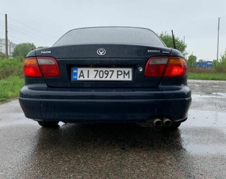 Синий Мазда Кседос 9, объемом двигателя 2.5 л и пробегом 385 тыс. км за 2200 $, фото 7 на Automoto.ua