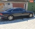 Синий Мазда Кседос 9, объемом двигателя 2.5 л и пробегом 350 тыс. км за 1600 $, фото 2 на Automoto.ua